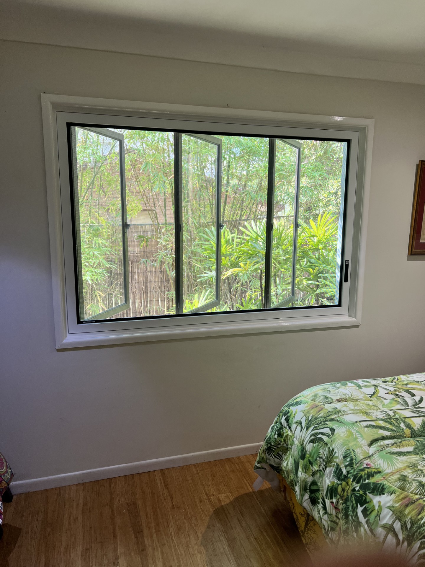 Large ForceField hinge window security screen on bank of casement windows